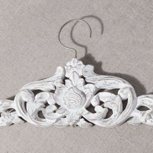 Carved wood hanger